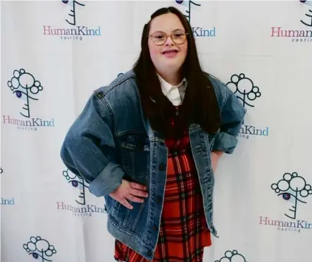  ?? ?? “I danced. I modeled. I wore a dress with ruffles, and I made a new friend,” said Isla Newton, 14. “I did a pose like this” she demonstrat­ed with one hand on her hip.