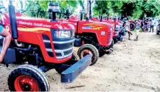  ??  ?? Mahindra tractors lined-up for servicing at DIMO - Mahindra Tractor Service Camp