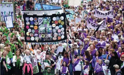  ?? Photograph: Jeff J Mitchell/Getty Images ?? Women marching in Edinburgh on Sunday during Procession­s 2018 to mark 100 years since women won the right to vote in the UK.