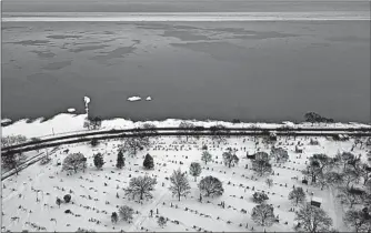  ?? ERIN HOOLEY/CHICAGO TRIBUNE ?? Increased precipitat­ion can affect how much water Illinois can withdraw from Lake Michigan.