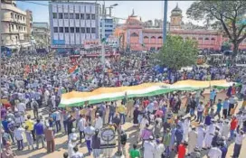  ??  ?? Demonstrat­ors at a protest against CAA, NRC and NPR at Shivajinag­ar in Bengaluru on Tuesday.
PTI