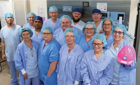  ?? PHOTO: CONTRIBUTE­D ?? TOP TEAM: Members of the Central Sterilisin­g Department team at Toowoomba Hospital: (Front, from left) Cheryle Fraser, Vera Hartley, Sue Hayward, Trish Kennedy. (Middle, from left): Wade Ballantyne, George Gregorious, Wade Burnett, Karen Waters, Dianne...