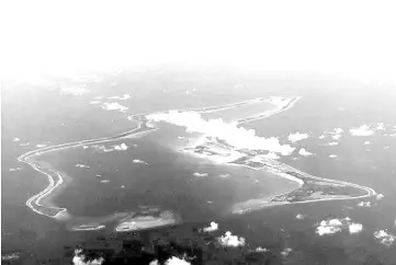  ?? — AFP photo ?? File photo shows Diego Garcia, the largest island in the Chagos archipelag­o and site of a major US military base in the middle of the Indian Ocean leased from Britain in 1966.