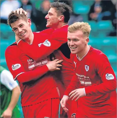  ?? Picture: SNS Group. ?? Raith Rovers’ Dougie Hill, left, is congratula­ted by Ross Callachan and Fraser Mullen, right, after scoring the second goal of the game for the visitors.