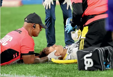  ??  ?? Ruben Love was cleared of any serious spinal injury after these frightenin­g scenes at the Sydney Cricket Ground on Friday.