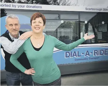  ??  ?? Tim Lawson and Julie Banks celebrate their funding success at Dial-a-Ride.