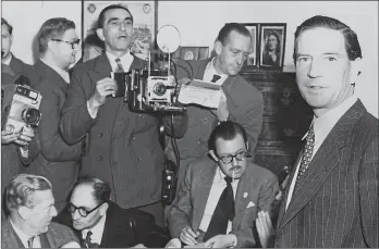  ??  ?? Philby, right, holds a press conference at his mother’s house, denying he was a spy