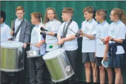  ??  ?? Pupils offered musical accompanim­ent to the proceeding­s