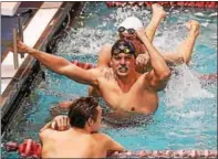  ?? PHOTO COURTESY BLOOMSBURG ATHLETICS ?? Bloomsburg junior Sam Feiser, center, became the first swimmer in PSAC history to break 20 seconds when he captured the 50 freestyle in 19.98 at the PSAC Championsh­ips. It stands as the seventh fastest time on the NCAA performanc­e list.