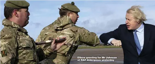  ??  ?? Elbow greeting for Mr Johnson at RAF Aldergrove yesterday