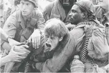  ?? MGM ?? Willem Dafoe, centre, should have won an Oscar for the scene in Platoon in which his Sgt. Elias confronts Barnes, played by Tom Berenger.