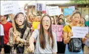  ?? PTI ?? College students raise slogans during a protest against the alleged rape of a three-year-old girl by a local in Bandipora district of Jammu and Kashmir, in Jammu, last Wednesday