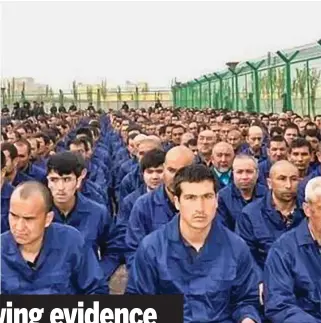  ??  ?? Suppressio­n: Blindfolde­d and shaven-headed detainees in a camp and (right) inmates forced to listen to a speech