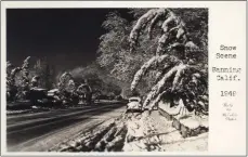  ?? COURTESY OF STEVE LECH ?? A Mcculloh Studio photo shows the depth of snow in Banning in winter 1949.