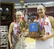  ?? KIRK NEIDERMYER — FOR DIGITAL FIRST MEDIA ?? Upper Dublin’s Maggie Weglos (25) and Nicole Kaiser (11) pose with the championsh­ip trophy after winning the PIAA 6A championsh­ip at the Giant Center in Hershey Tuesday.