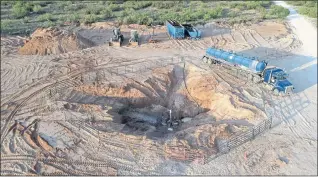  ?? ASHLEY WILLIAMS WATT VIA ASSOCIATED PRESS ?? The Estes 24 well leaks on the Antina ranch in Crane, Texas. Chevron, which is responsibl­e for the abandoned well, has been working to re-plug it.