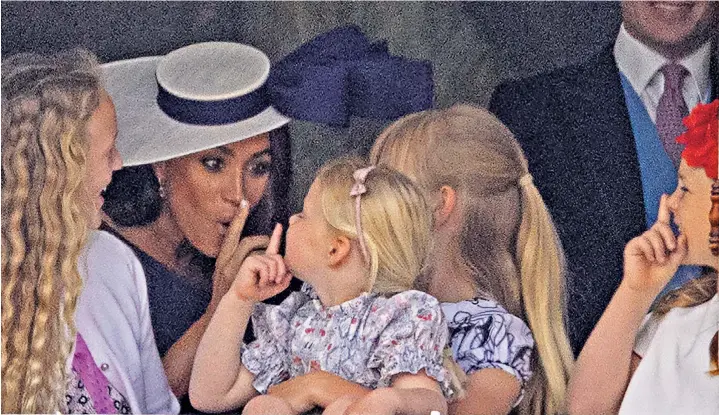  ?? ?? Clockwise from main picture below: the Duchess of Sussex playfully shushes Isla and Savannah Phillips and Lena Tindall; Meghan and the Duke of Sussex talk to the Queen’s cousin, the Duke of Kent; Prince Harry joins in the fun as they are joined by Mia Tindall