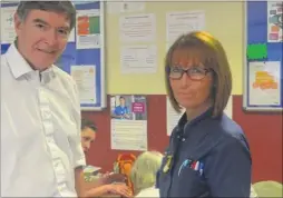  ??  ?? Health Minister Philip Dunne visits staff at the William Harvey Hospital