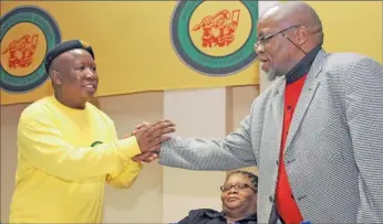  ?? PICTURE:TIRO RAMATLHATS­E ?? MEET AND GREET: ANC Youth League president Julius Malema greets ANC secretary-general Gwede Mantashe during the league’s lekgotla in Pretoria at the weekend. In the background is North West Premier and NEC member Thandi Modise.
