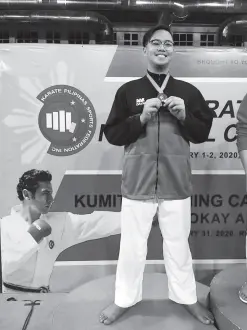  ??  ?? BROKENSHIR­E Colleges’ Stephen James Cartagena stands tall with his silver finish in the Cadets +70kgs kumite.
