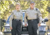  ?? RALPH BARRERA / AMERICAN-STATESMAN ?? Margo Ball and partner H. ‘Hans’ Mertens participat­e in the Travis County Sheriff’s Office’s Citizens on Patrol Services program. The duo, here in Steiner Ranch in Northwest Austin, patrol neighborho­ods two days a week to help cut crime.