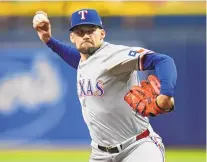  ?? ASSOCIATED PRESS ?? Texas Rangers starting pitcher Nathan Eovaldi delivers to the Tampa Bay Rays during Wednesday’s game in St. Petersburg, Fla.