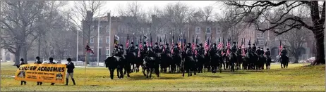  ?? PHOTO BY JACQUE RYAN ?? Culver Military Academy’s Black Horse Troop and the Equestrien­nes of Culver Girls Academy practicing the ‘pass and review’ for the inaugural parade