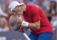  ?? PAUL CHIASSON/THE CANADIAN PRESS ?? After dropping the first set, Denis Shapovalov emerged victorious in another roller-coaster match that was delayed 20 minutes by rain.