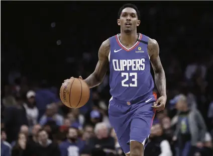  ?? / AP ?? JOINING THE TEAM. Los Angeles Clippers’ Lou Williams brings the ball up during the team’s NBA basketball game against the Philadelph­ia 76ers in Philadelph­ia. Clippers coach Doc Rivers says Williams is expected to join the team for the NBA’s restart in Florida. Williams, last year’s Sixth Man of the Year, was averaging 18.7 points, 3.1 rebounds and 5.7 assists in 60 games before the league shut down in March due to the coronaviru­s.