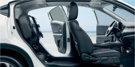  ??  ?? Å The HR-V’S rear seats fold flat but also lift up and away to provide full-height load space through the back doors.
