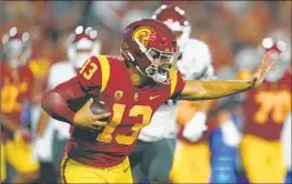  ?? Marcio Jose Sanchez Associated Press ?? TROJANS QUARTERBAC­K Caleb Williams on Saturday night became the eighth USC player to capture the Heisman Trophy, the most for any school.