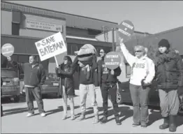  ?? GRAHAM PAINE, METROLAND ?? Supporters of Robert Bateman High School rally in March as they lobbied to avoid closure of the Burlington high school.