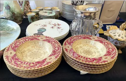  ?? TRACEE HERBAUGH VIA AP ?? This shows some of the china for sale at a flea market in Brimfield, Mass. China has become a staple at flea markets, as younger people opt to sell or donate heirloom dishware.