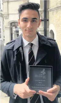  ??  ?? ●●Ali Abod with his Shine Media award
