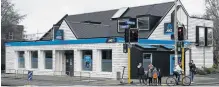  ?? PHOTO: GERARD O’BRIEN ?? Headed out . . . The Otago University branch of the ANZ bank on the corner of Cumberland and Albany Sts.