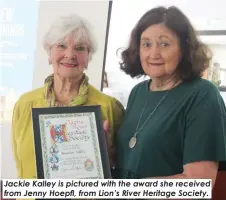  ?? ?? Jackie Kalley is pictured with the award she received from Jenny Hoepfl, from Lion’s River Heritage Society.