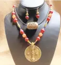  ??  ?? Sonja Holleman, “Ashanti Pendant and Ghana Glass Bead,” jeweler, at Gallery 57 West