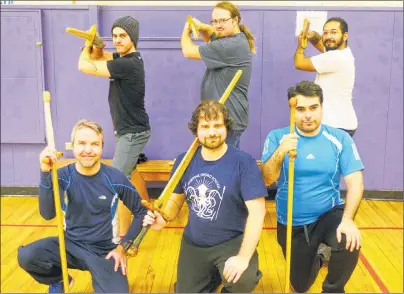  ?? MITCH MACDONALD/THE GUARDIAN ?? Members of the Maritime Sword School include, from front left, Michael Smallwood, Evan Hill, Rafael Aguirre, Matt MacDonald, Chris Cheverie and Anthony McLennon. The group, which is open to anyone 16 and older, meets at St. Jean Elementary School every...