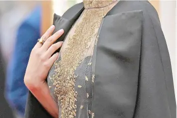  ?? — AFP photo ?? File photo shows Portman wears a cape embroidere­d with the names of female film directors who were not nominated for Oscars as she arrives for the 92nd Oscars at the Dolby Theatre in Hollywood, California.