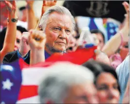  ?? DAVID BECKER/ LAS VEGAS REVIEW-JOURNAL ?? Actor Jon Voight attends a rally Tuesday in support of Israel’s ongoing military operations in the Gaza Strip at the Lloyd George U.S. Courthouse. About 500 people joined together to sing, pray and listen to speeches.