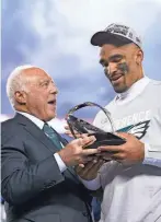  ?? MATT SLOCUM/AP ?? The Eagles’ Jeffrey Lurie and Jalen Hurts celebrate after the NFC Championsh­ip on Jan. 29 in Philadelph­ia.