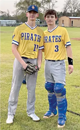  ?? Photo by Lacey DeBerry ?? ■ James Bowie pitcher Zane DeBerry (left) poses with catcher Garrett Brown after throwing a no-hitter in a 1-0 win against McLeod on March 26.