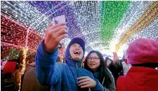  ?? PHOTO: AP ?? Festival-goers in Taiwan at the Taipei Lantern Festival. The Chinese New Year holiday is a massive internatio­nal event.