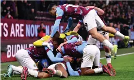  ?? Watford. Photograph: Richard Sellers/Getty Images ?? Michael Obafemi is buried under his Burnley teammates after his late equaliser against