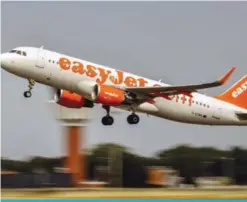  ??  ?? LILLE: In this file photo shows an aircraft of British low-cost airline EasyJet taking off from Lille Airport in Lesquin, northern France. —AFP