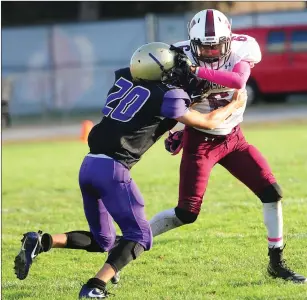  ?? Photos by Ernest A. Brown ?? The Woonsocket football team stayed alive in the Division I playoff hunt with a 22-8 victory over quarterbac­k Devan O’Malley (4, top left) and St. Raphael Friday at Pariseau Field.