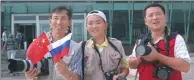  ?? PROVIDED TO CHINA DAILY ?? From left: Qiu Xianglin, Qiu Guodong and Qiu Qilong at Heihe Port.