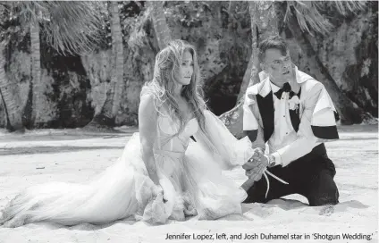 ?? ANA CARBALLOSA Lionsgate via AP ?? Jennifer Lopez, left, and Josh Duhamel star in ‘Shotgun Wedding.’