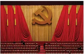  ?? ANDY WONG / AP ?? The vote to enshrine Chinese President Xi Jinping in the constituti­on came on the final day of the weeklong 19th Party Congress, a gathering held once every five years in the Great Hall of the People (above)on the west side of Beijing’s Tiananmen Square.