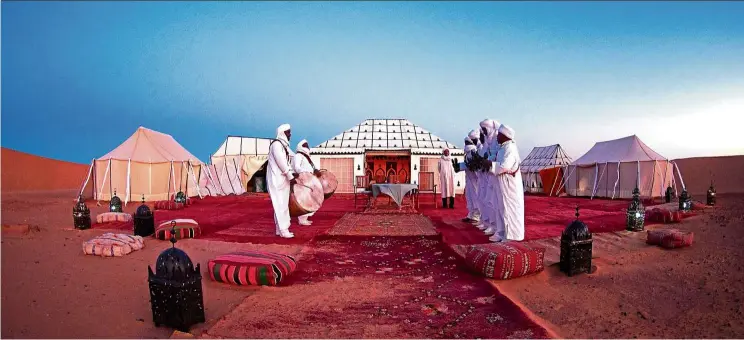  ??  ?? A luxury camp in the Sahara desert of Morocco.